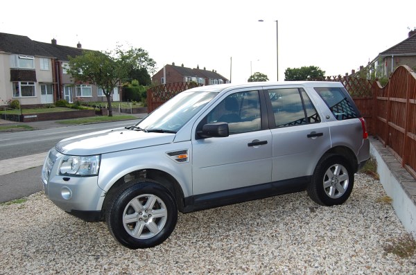 A silver four-by-four on the forecourt