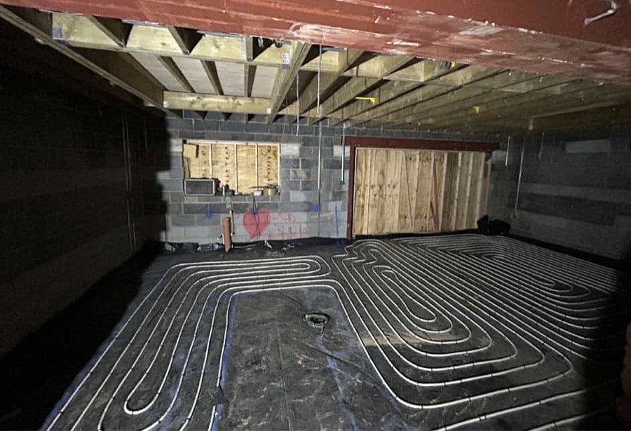 Underfloor heating pipes laid before the screed