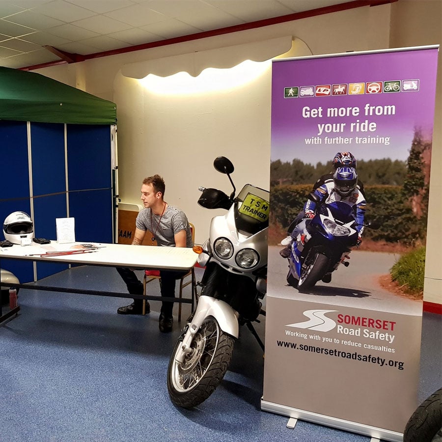 The school&rsquo;s stand with a motorcycle and a Somerset Road Safety banner