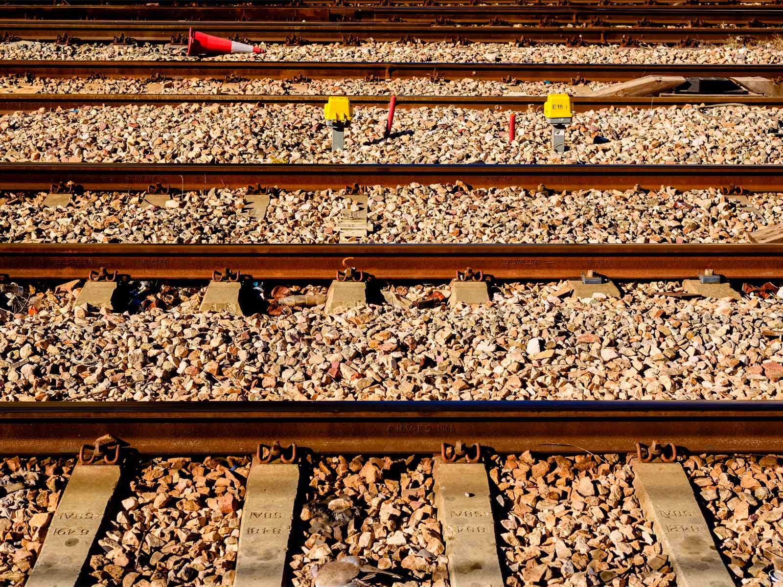 Railway track bedded in crushed stone ballast