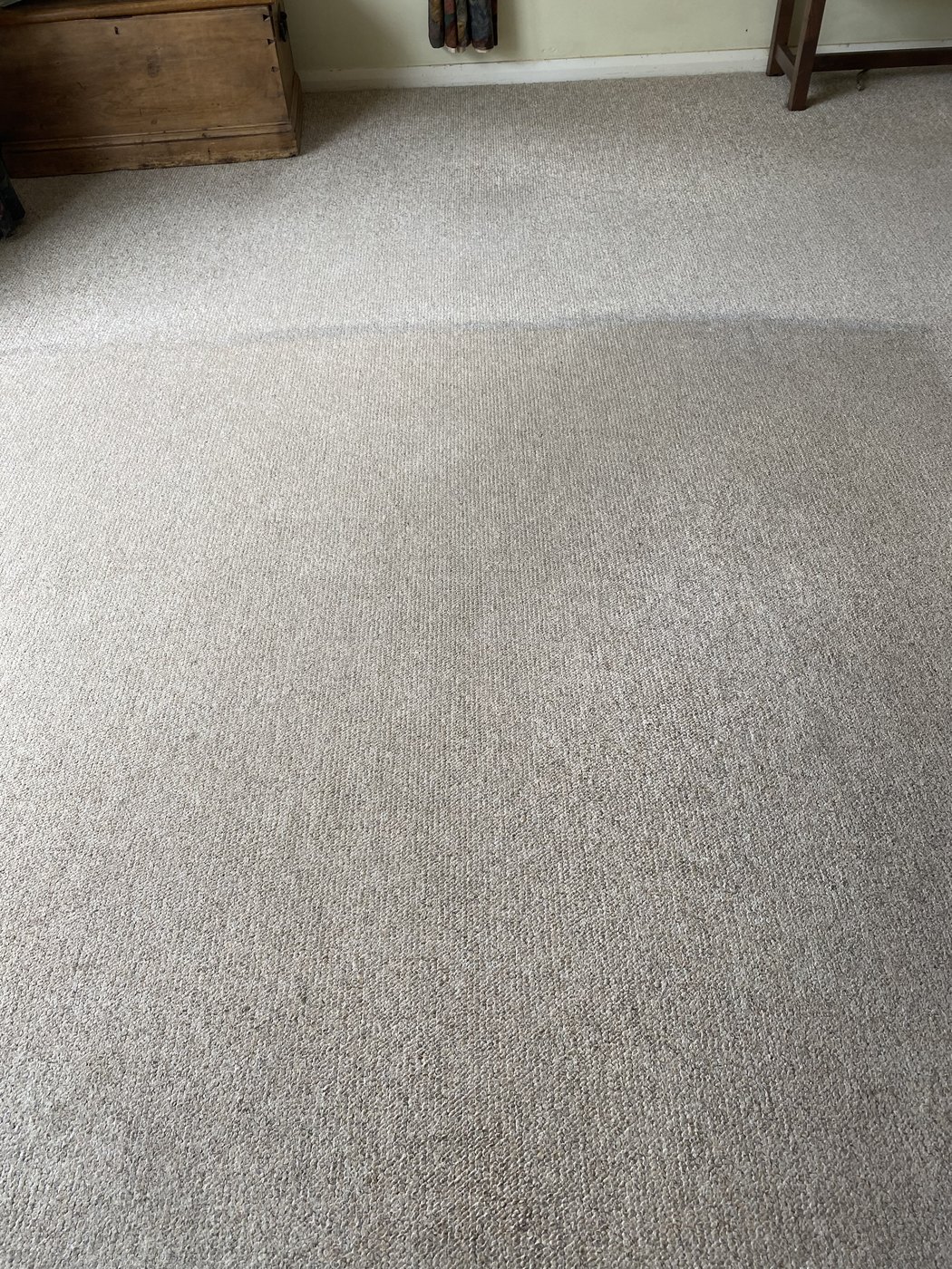 Traffic lane lifted out of a lounge carpet — after