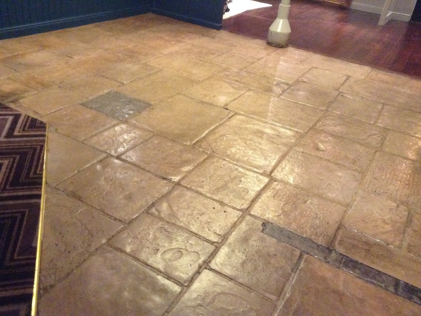 A flagstone floor cleaned by Ashton Cleaning — after