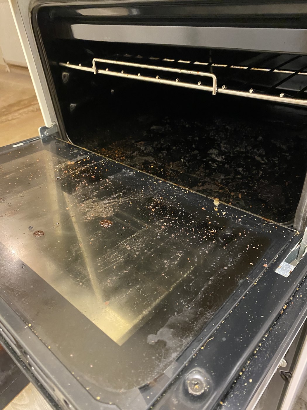 An oven cleaned by Ashton Cleaning — before