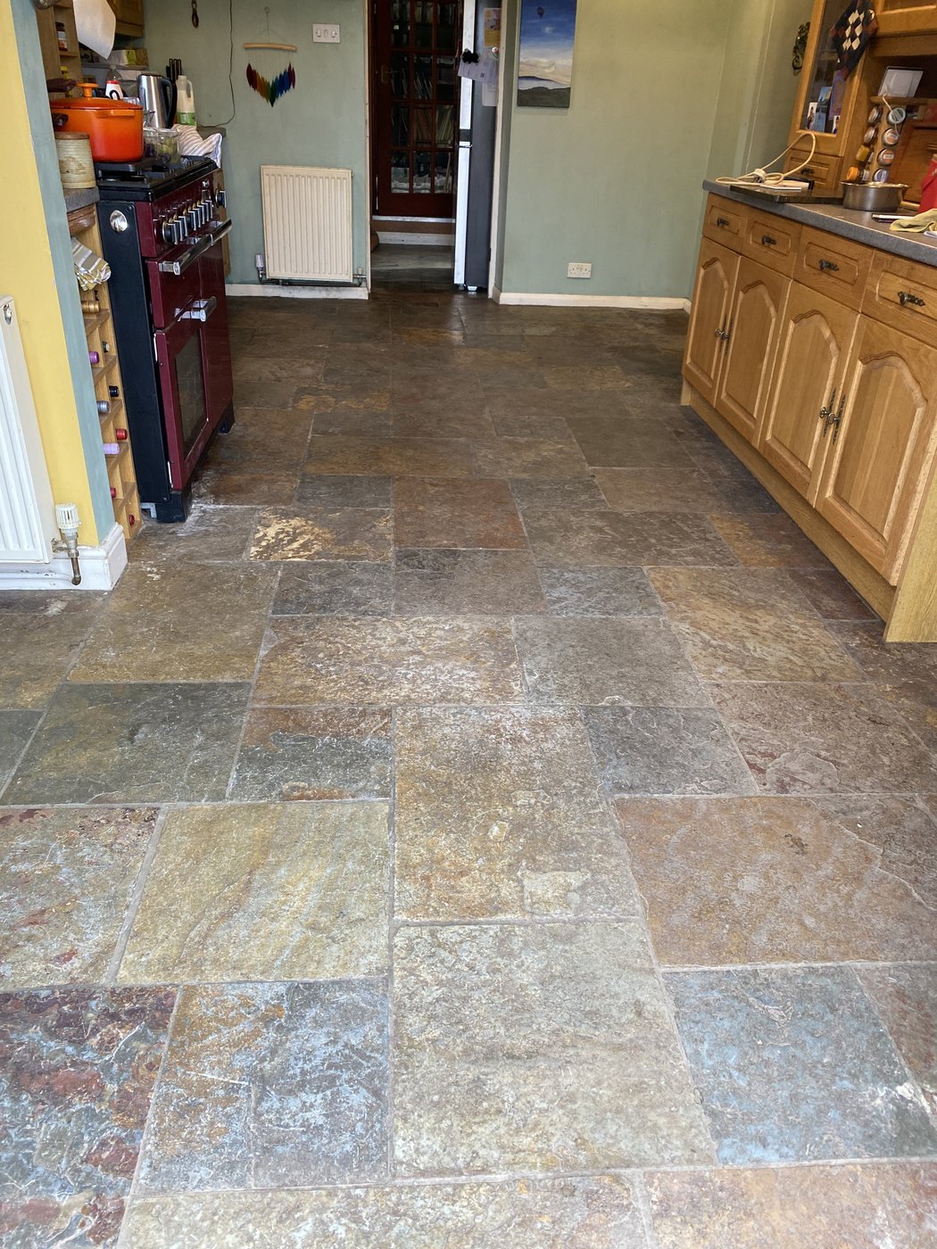 Slate floor cleaned and re-sealed — before
