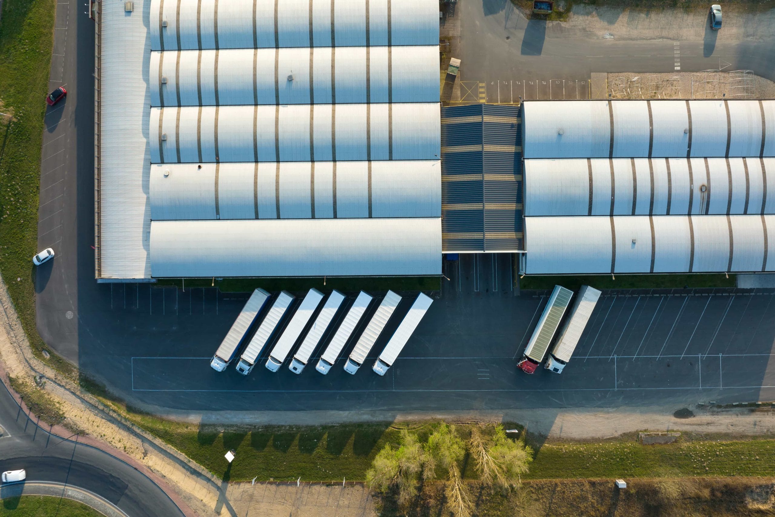 An aerial view of lorries at a warehouse